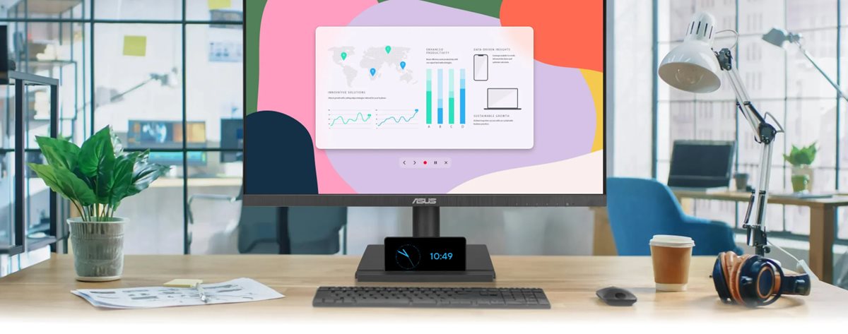 A situational image of a computer screen on the table with some business charts inside